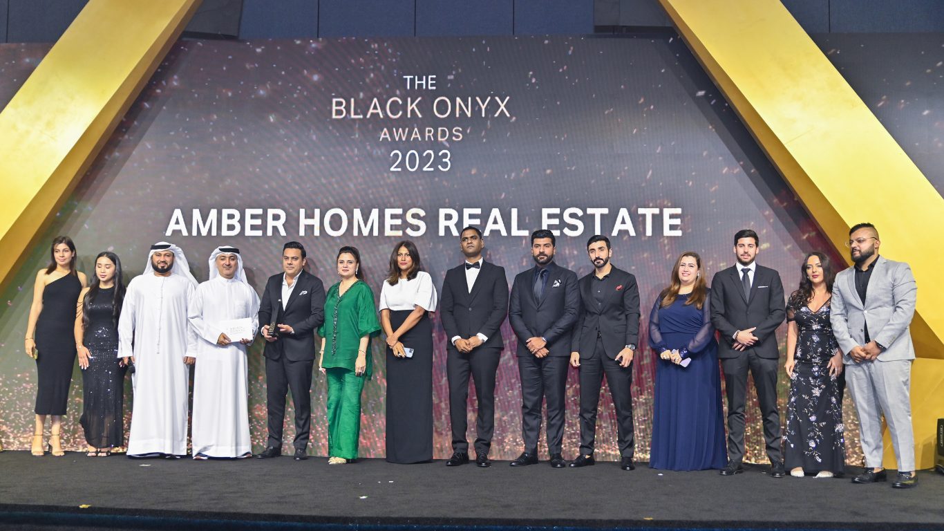 Saad Waqas and the Amber Homes Real Estate team receiving Top Platinum Sales Agency 2023 at The Black Onyx Awards, Meraas, Nakheel & Dubai Holding, Dubai