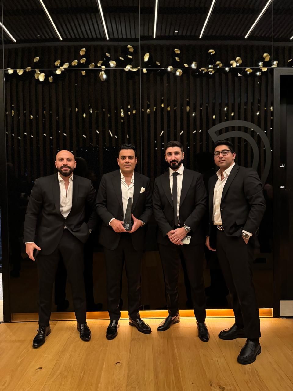 Saad Waqas with the Amber Homes Real Estate team at the 2024 Black Onyx Awards, Dubai